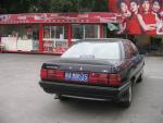 Chinese_copy_of_an_Audi_100_seen_at_Shanghai_Stadium__from_behind_.jpg